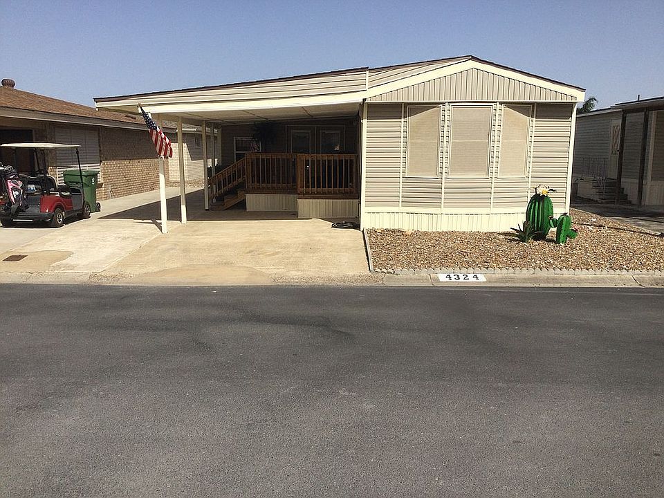 Front view of Home. Carport