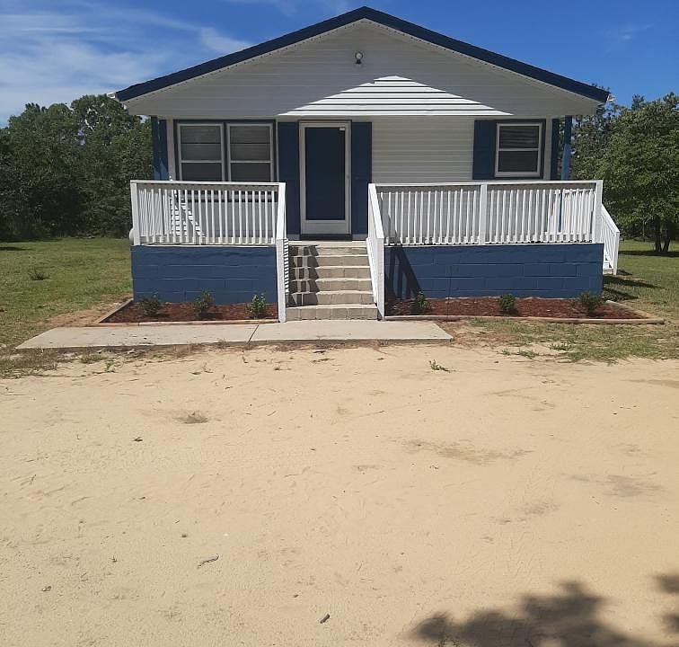 Freshly painted exterior with landscaping added