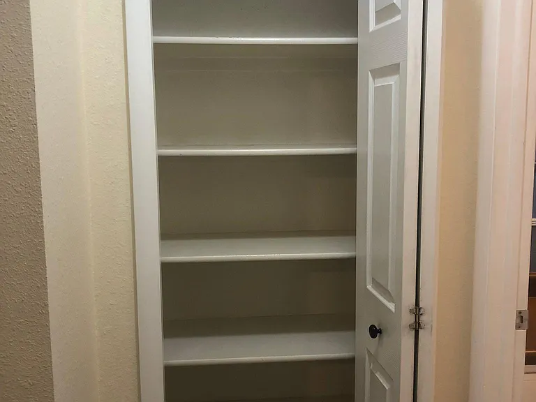 Linen Closet Outside of Upper Bathroom.