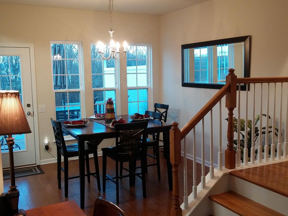 dinning area with all hardwood floors. Walk out to patio.