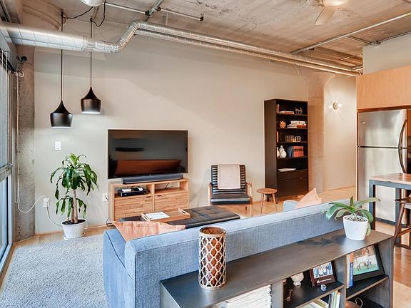 Enjoy the high ceilings and exposed duct work!