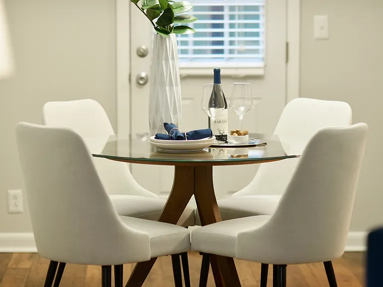 Dining area with hardwood-style flooring