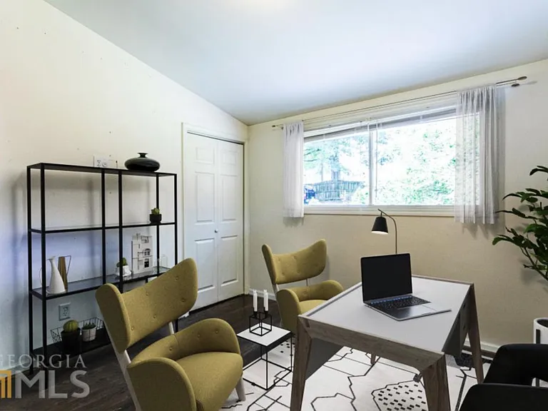 Virtually staged third bedroom as an office.