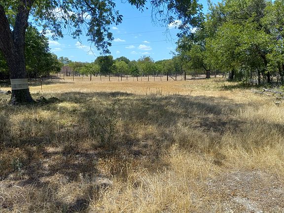 back yard behind 2 car garage