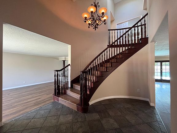 elegant foyer with beautiful staircase