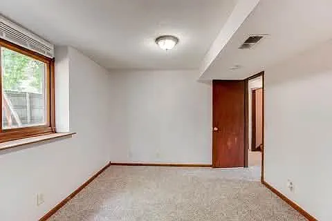 7417 Meadowwood Dr N — Photo 18