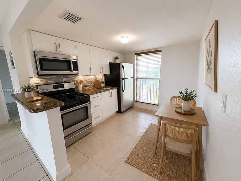 241 S Royal Poinciana Blvd #310 — Photo 3