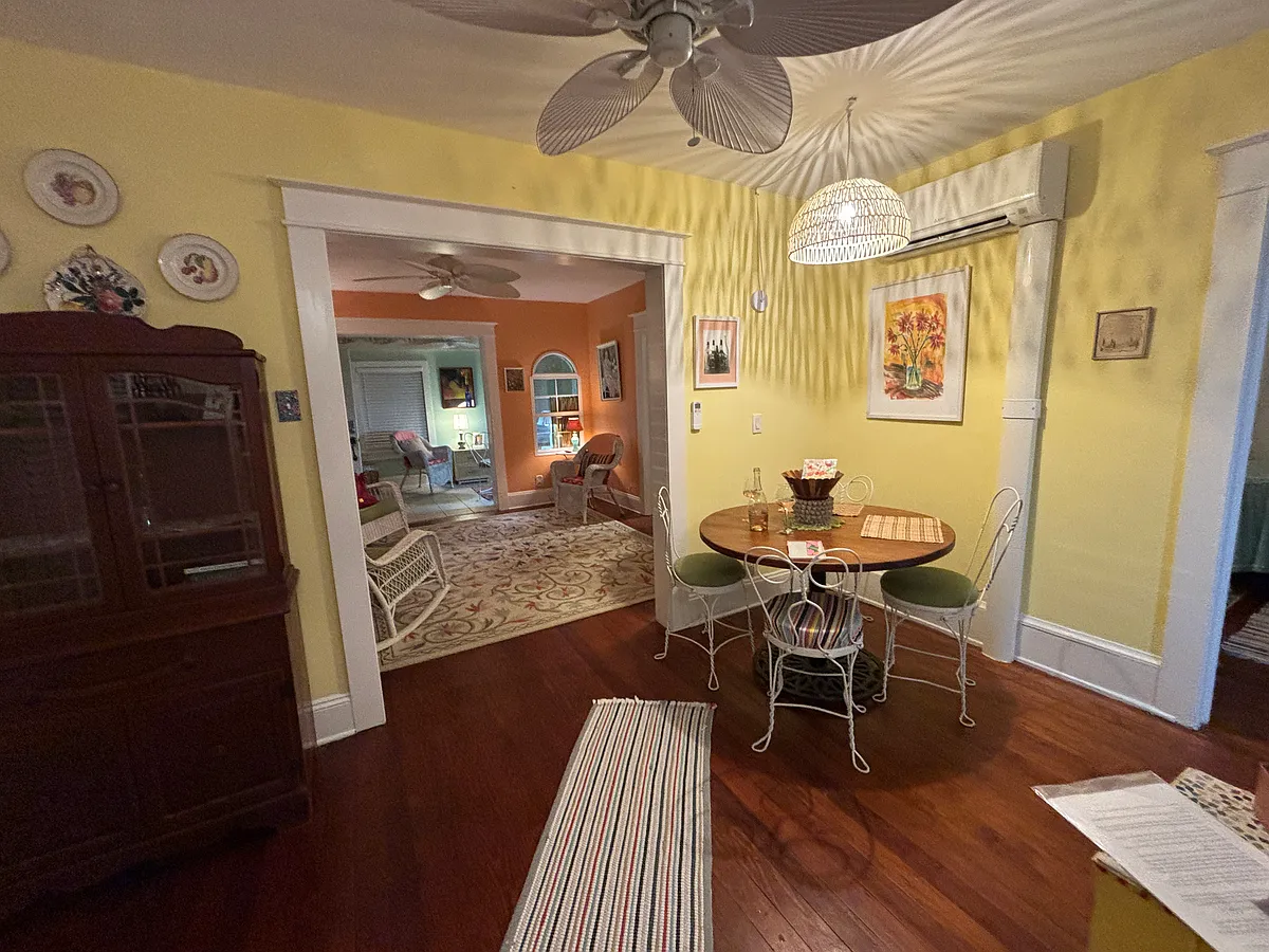 Dining area to Living room beyond. On right door is to back BR. - 132 S Wild Olive Ave