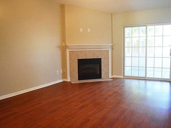 Living room with vaulted ceilings and gas fireplace