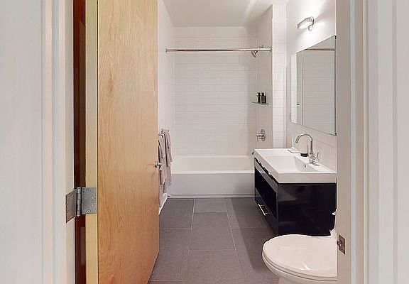 5th image of 550 W 54th St APT 1212