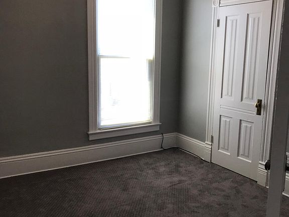 Bedroom with walk-in closet.
