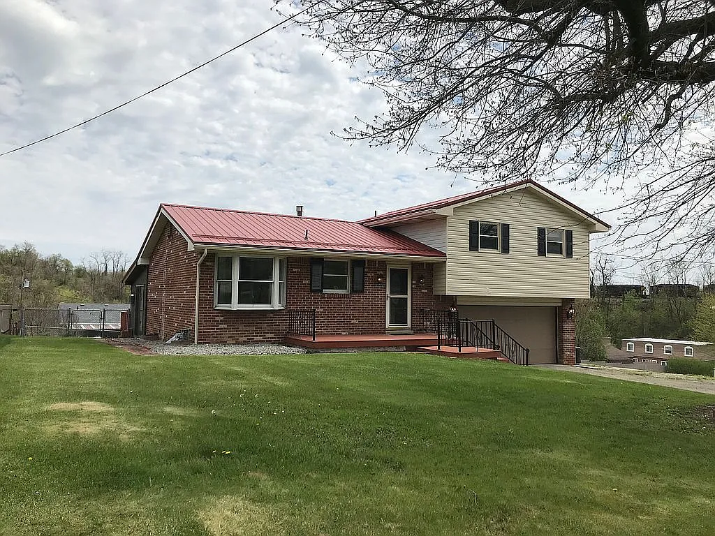 1034 Rostraver Rd photo 1