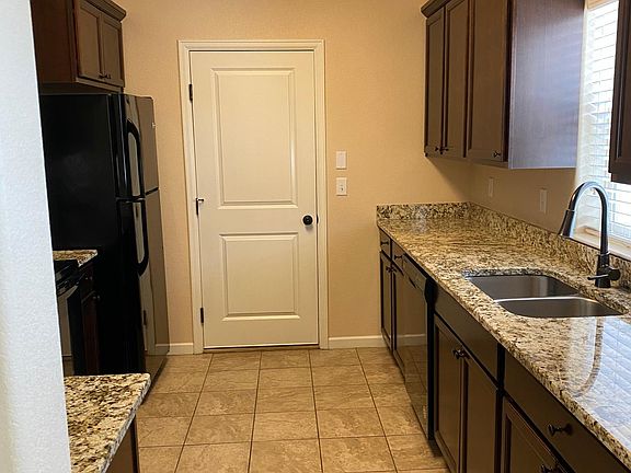 Kitchen that leads to the garage.
