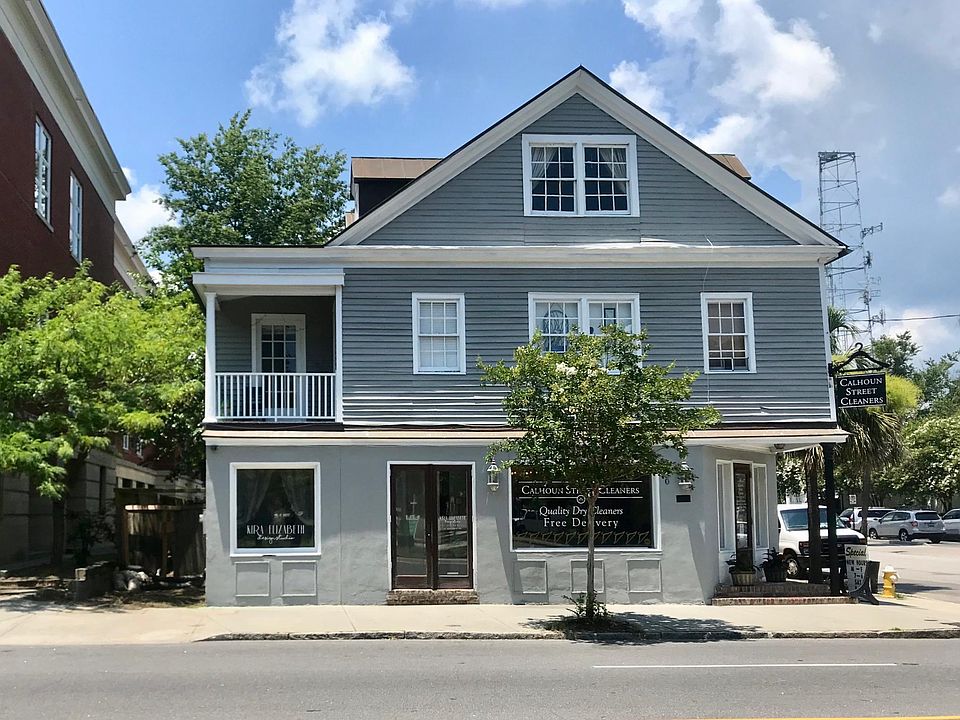 Apartment is on the left hand side with the porch.