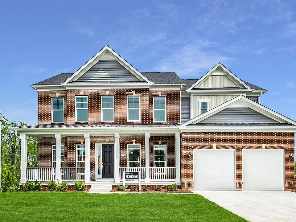 Exterior View of the Richmond Plan, a two-story family home with a 2-car garage