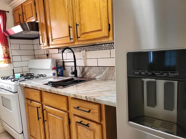 Refrigerator is two years old all ready to deliver COLD crushed or regular cubes for summer!