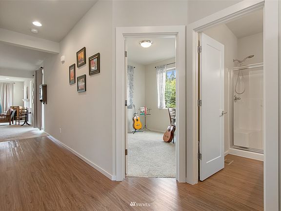 Spacious entry that leads to office/den and great room.