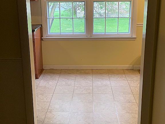 Kitchen on the left, dining room on the right