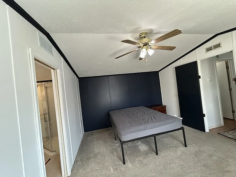 Master room currently with a Queen size bed