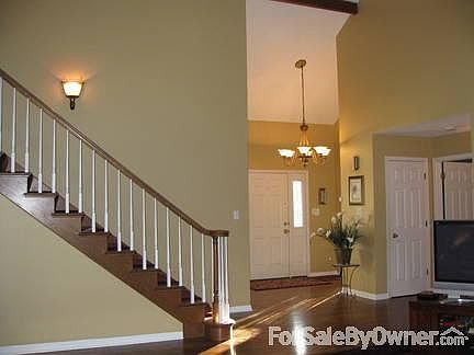 Hall and Stairs
						:
						Hardwood floors and updated lighting
