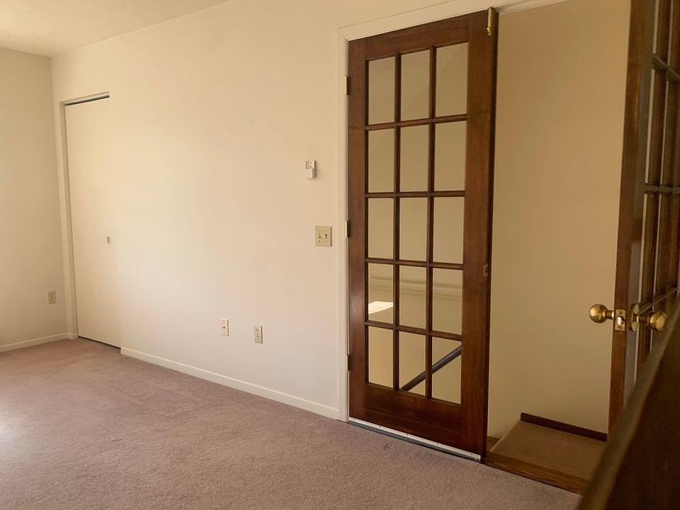 Double entry doors into living room making it easy to move in furniture
