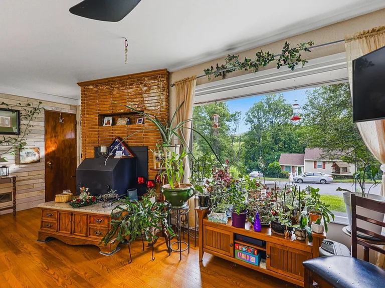 MAIN LEVEL: Living Room with Coat Closet, Fireplace Insert, Picture Window (Dining Room to left)