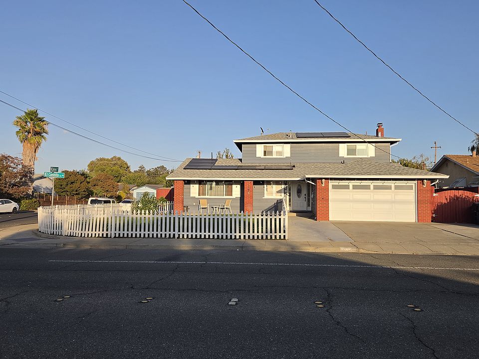 Front view of the house with Solar