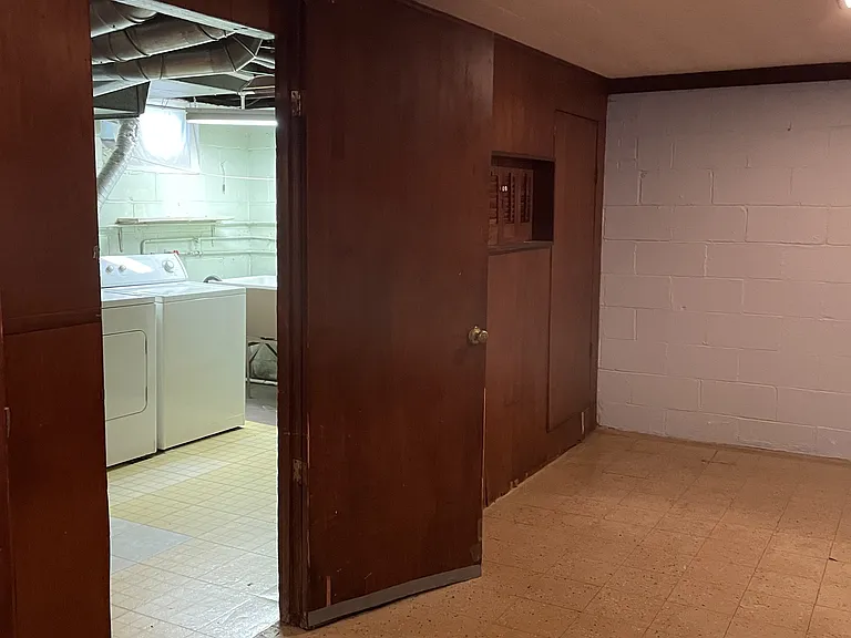 Basement is divided in half. Recreation area and utility area
