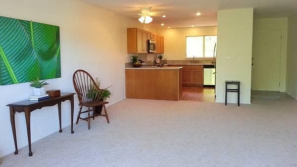 Kitchen opens up to dining/living area