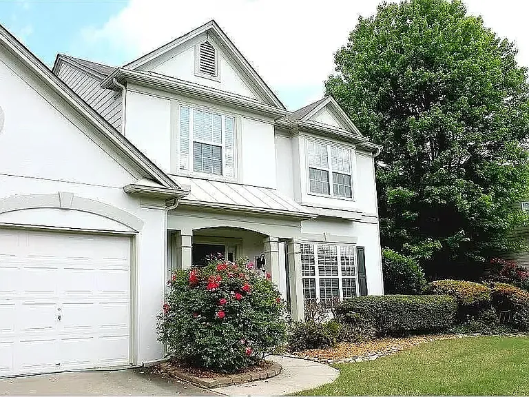 7320 Brassfield Dr — Photo 1