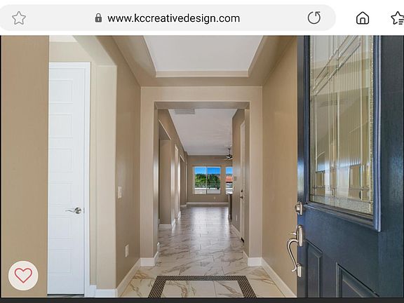 Entry with Decorative tile and view to outdoor living.
