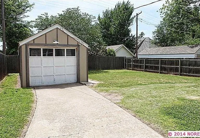 backyard and 1-car garage