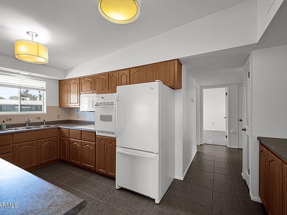 4th image of 10715 W ABBOTT Avenue
