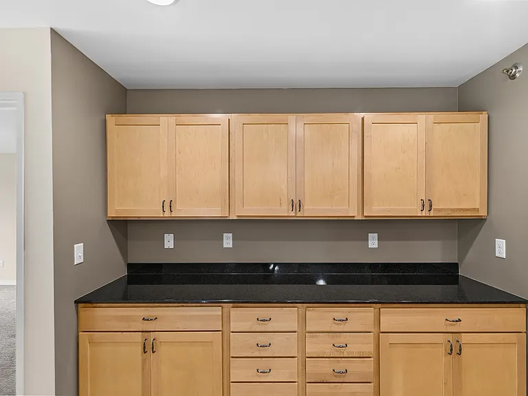 Elevate your living experience at Overlook Ridge with spacious cabinetry and modern finishes in this stylish kitchen. Perfect for culinary enthusiasts, enjoy the blend of functionality and design. Schedule a tour today!