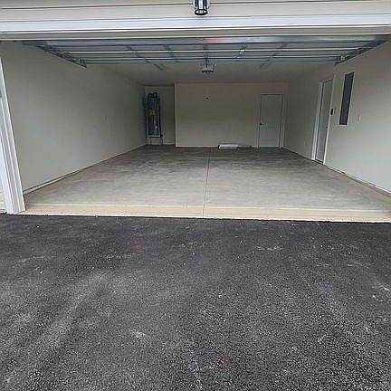 Double garage w storage area