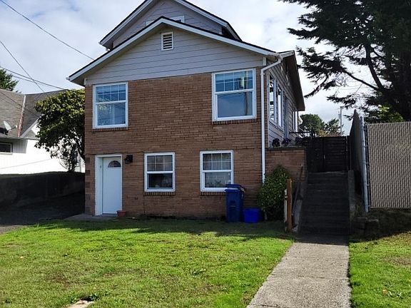 Right side entrance to the top of the home from the street.