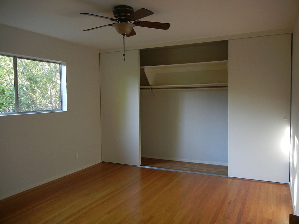 Bedroom with wall to wall closet