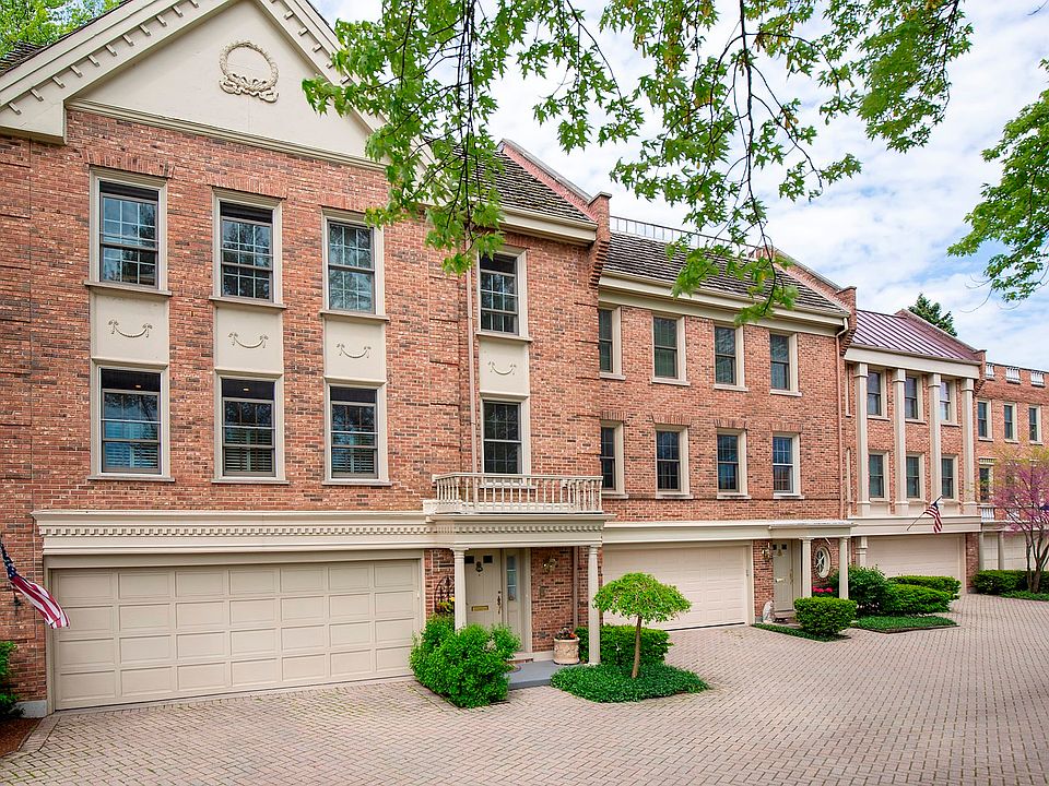 Stately brick exterior in the English tradition.