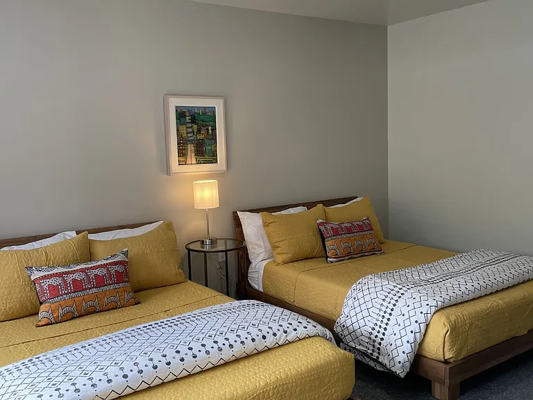 Bedroom #3 with large closet and 2 double beds.