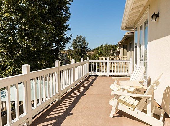 Large front deck runs from the living space to the Master Suite.
