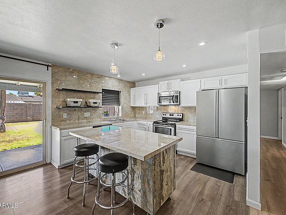 5th image of 8137 W MONTECITO Avenue