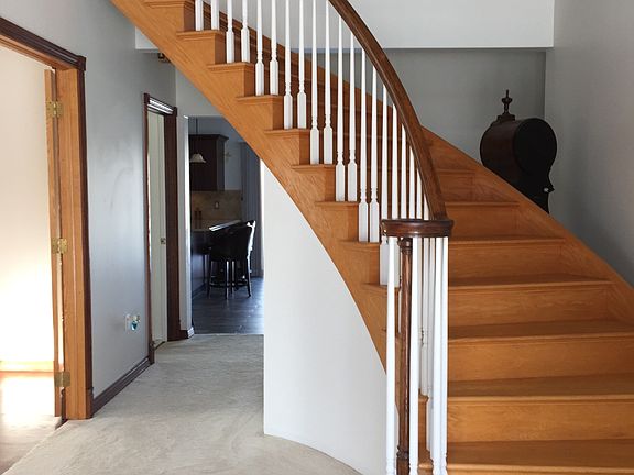 Oak staircase entryway.