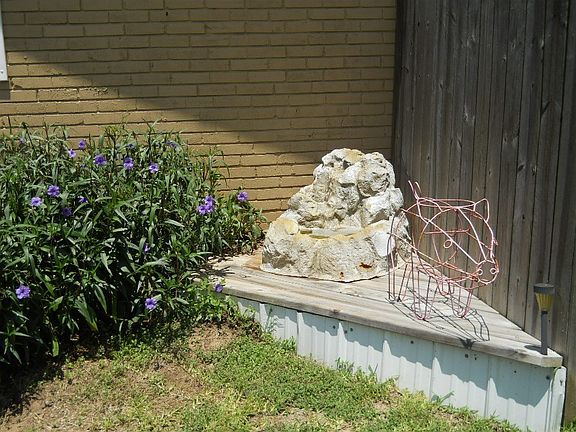 Water feature in yard.