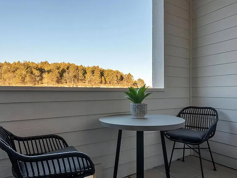 Private Apartment Patio with Outdoor Seating and Scenic Views