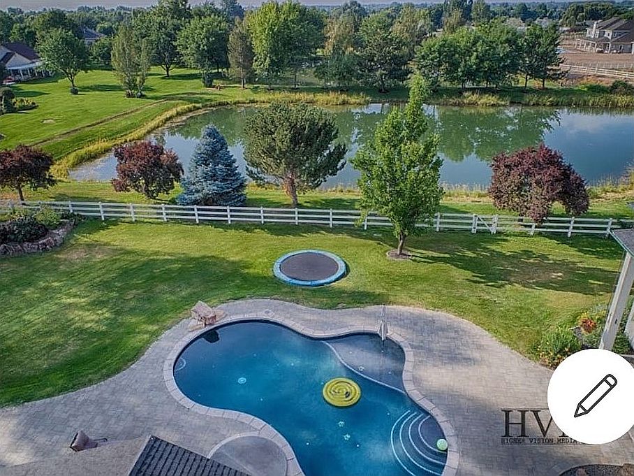 Backyard  with pool and pond