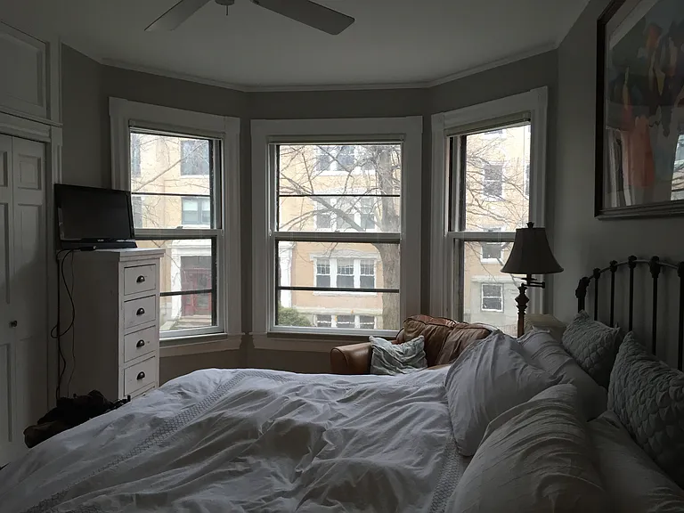 Main bedroom, king bed and bay windows. Multiple closets.