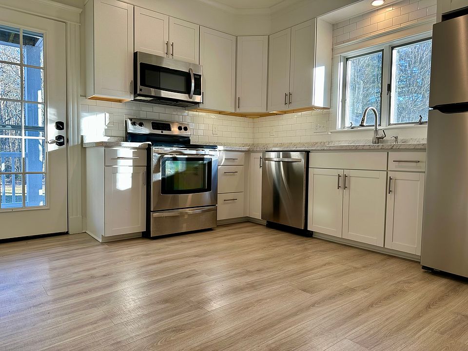 Kitchen with stainless steel appliances.