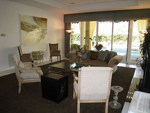 Living room wall opposite of fireplace wall. 