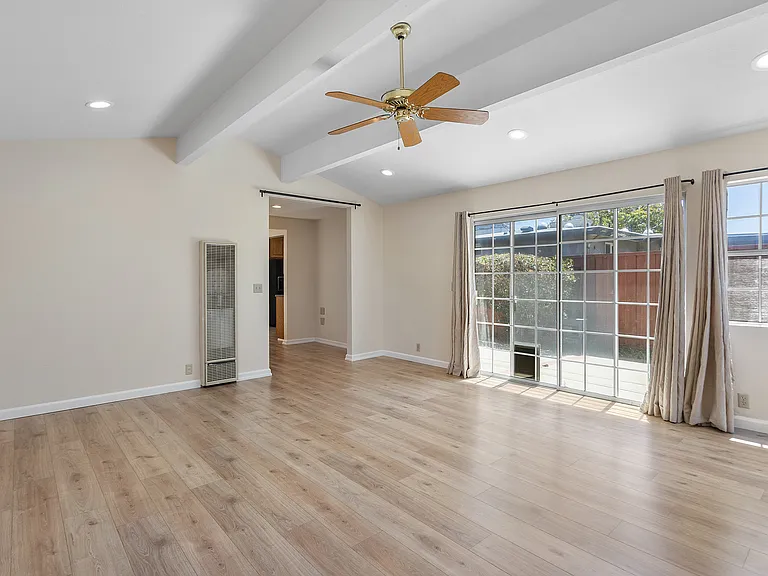 Large Family Room with door to outdoor patio