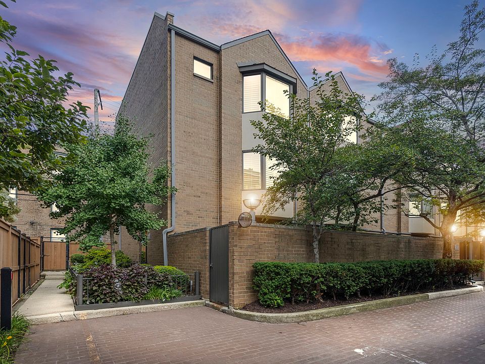 End unit entry - access through patio door and front main door along the inviting path